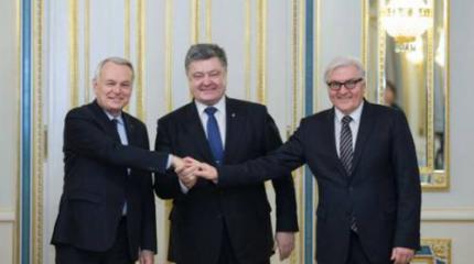 За улыбками в Киеве Штайнмайера, Эйро и Порошенко политическое бессилие