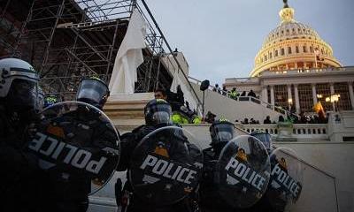 Полицейские США угрожают бунтовщикам расправой Полицейские США угрожают бунтовщикам расправой