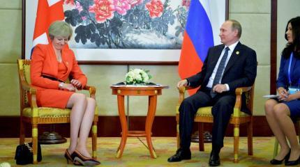 Мэй отлично сыграла на подтанцовке у Путина Мэй отлично сыграла на подтанцовке у Путина