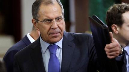 Лавров угостил журналистов русской водкой и американской пиццей Лавров угостил журналистов русской водкой и американской пиццей
