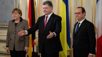 Какое решение приняли Олланд, Меркель и Порошенко