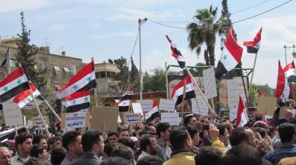 Сирийцы в Идлибе и Хаме вышли на протест против турецкой оккупации Сирийцы в Идлибе и Хаме вышли на протест против турецкой оккупации