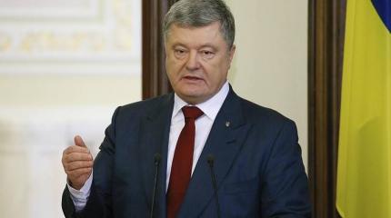 Порошенко припасет девять граммов свинца на случай войны с Россией Порошенко припасет девять граммов свинца на случай войны с Россией