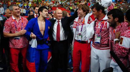 Зачем Путин отпустил спортсменов России под нейтральный флаг? Зачем Путин отпустил спортсменов России под нейтральный флаг?