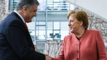 Порошенко в Германии: кукушка хвалит Петюха