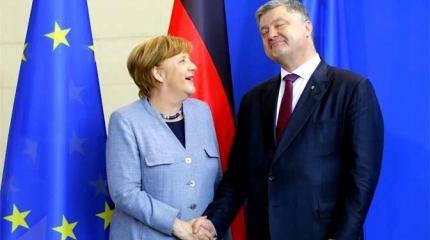 Меркель едет к Порошенко: Заговор «хромых уток» против Москвы Меркель едет к Порошенко: Заговор «хромых уток» против Москвы