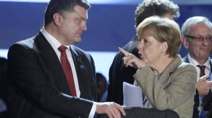 Франция и Германия «связали руки» Порошенко перед вторым туром Франция и Германия «связали руки» Порошенко перед вторым туром