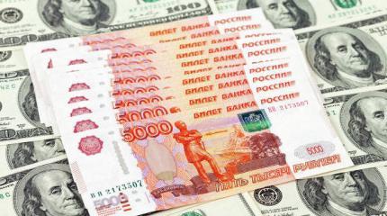 Нефть обваливает рубль: Курсы доллара и евро поднялись выше 70 и 80 рублей