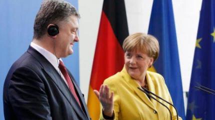 Порошено в Берлине: пустой выхлоп