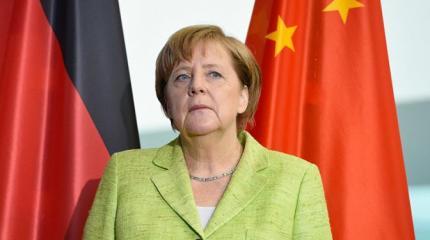 Фрау Меркель протягивает Востоку «руку дружбы» Фрау Меркель протягивает Востоку «руку дружбы»