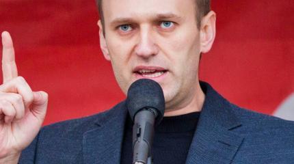 Навальный решил подать в суд на Путина Навальный решил подать в суд на Путина