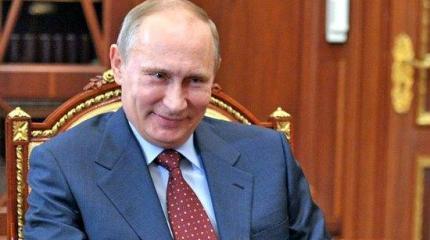«Коллектив офицеров ГРУ» развесил в Лондоне билборды с Путиным «Коллектив офицеров ГРУ» развесил в Лондоне билборды с Путиным