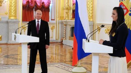 Путин рассказал о другом вкусе олимпийских медалей Путин рассказал о другом вкусе олимпийских медалей