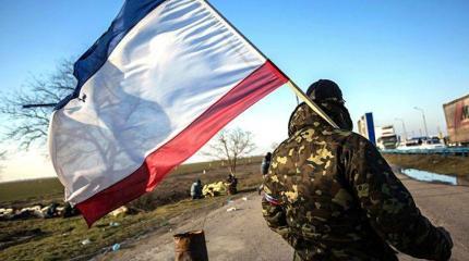 Усидеть на двух стульях: крымчане все равно используют украинские паспорта Усидеть на двух стульях: крымчане все равно используют украинские паспорта