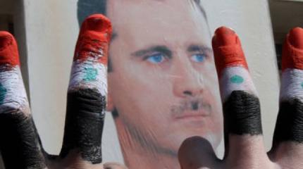 Башар Асад отстаивает позиции президентского кресла Башар Асад отстаивает позиции президентского кресла