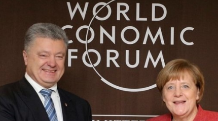 Порошенко встретился с Меркель в Давосе Порошенко встретился с Меркель в Давосе