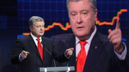 Порошенко сделал ставку на «длинные руки Москвы» Порошенко сделал ставку на «длинные руки Москвы»