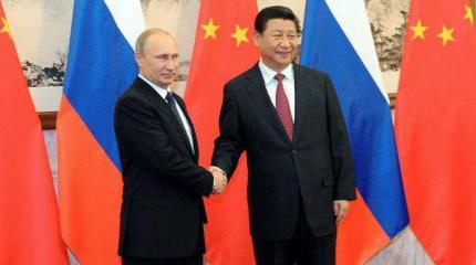 В Китае прокомментировали послание Путина Федеральному собранию В Китае прокомментировали послание Путина Федеральному собранию