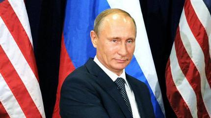 Почему Владимир Путин стоит над схваткой в США Почему Владимир Путин стоит над схваткой в США