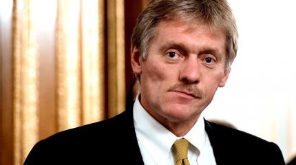 Песков описал тон беседы Путина и Порошенко в Берлине
