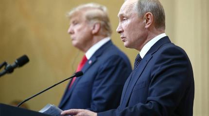 Путин пользуется в мире большим доверием, чем Трамп