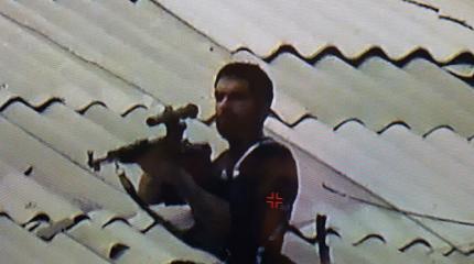 Полиция дала свидетелсьтва убийства своего сотрудника и фото снайпера