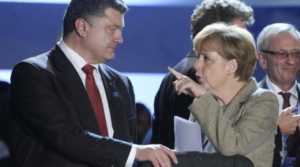 Меркель собралась вразумить Порошенко