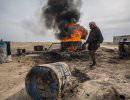 Сирийские террористы продают нефть в Турцию ведрами