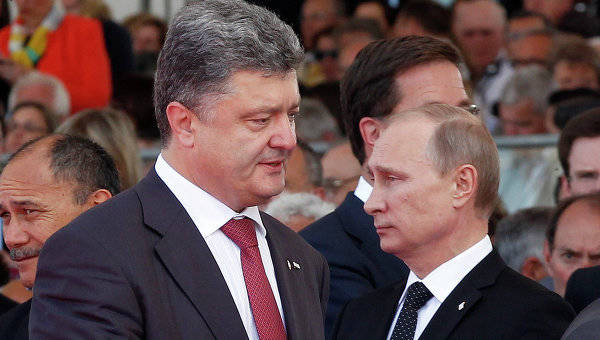 Путин и Порошенко обменялись приветствиями перед переговорами в Минске