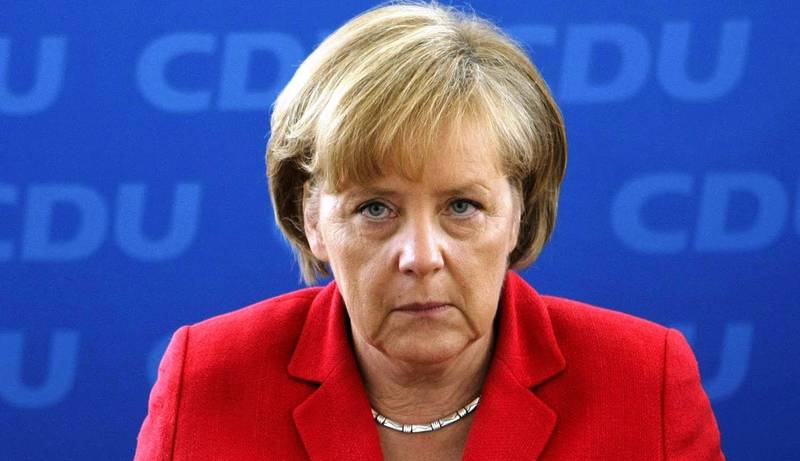 Меркель: ополченцы согласились на перемирие благодаря давлению Путина