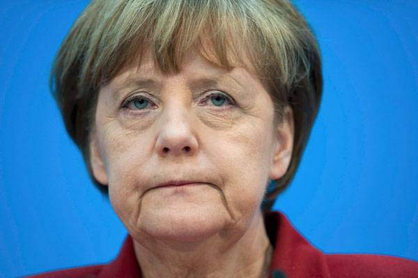 Фрау Меркель держит удар