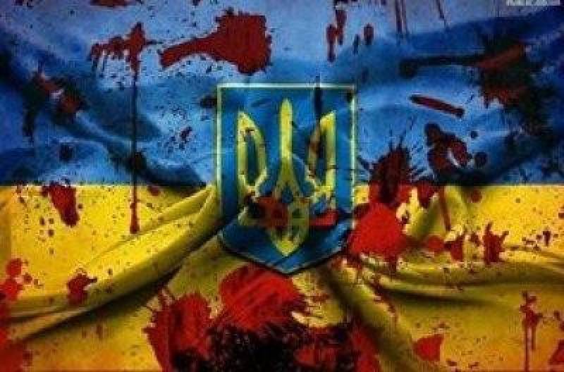 На Харьковщине флаги Украины облили кровавой краской