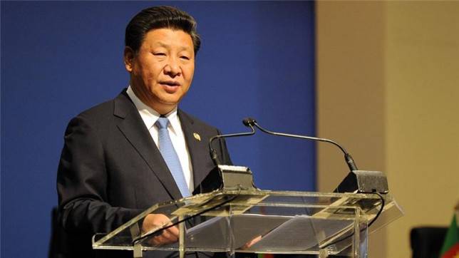 Китай уволил четырех репортеров за опечатку в статье про президента страны