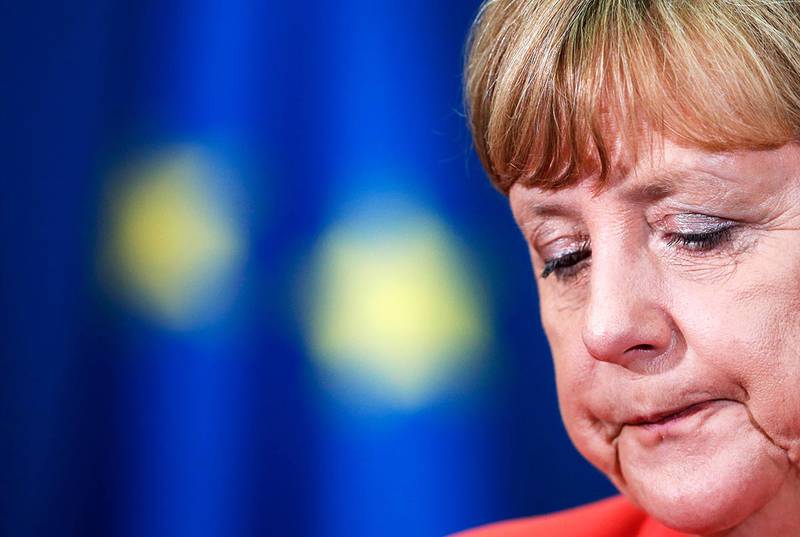 Меркель: беженцы могут подавить Германию