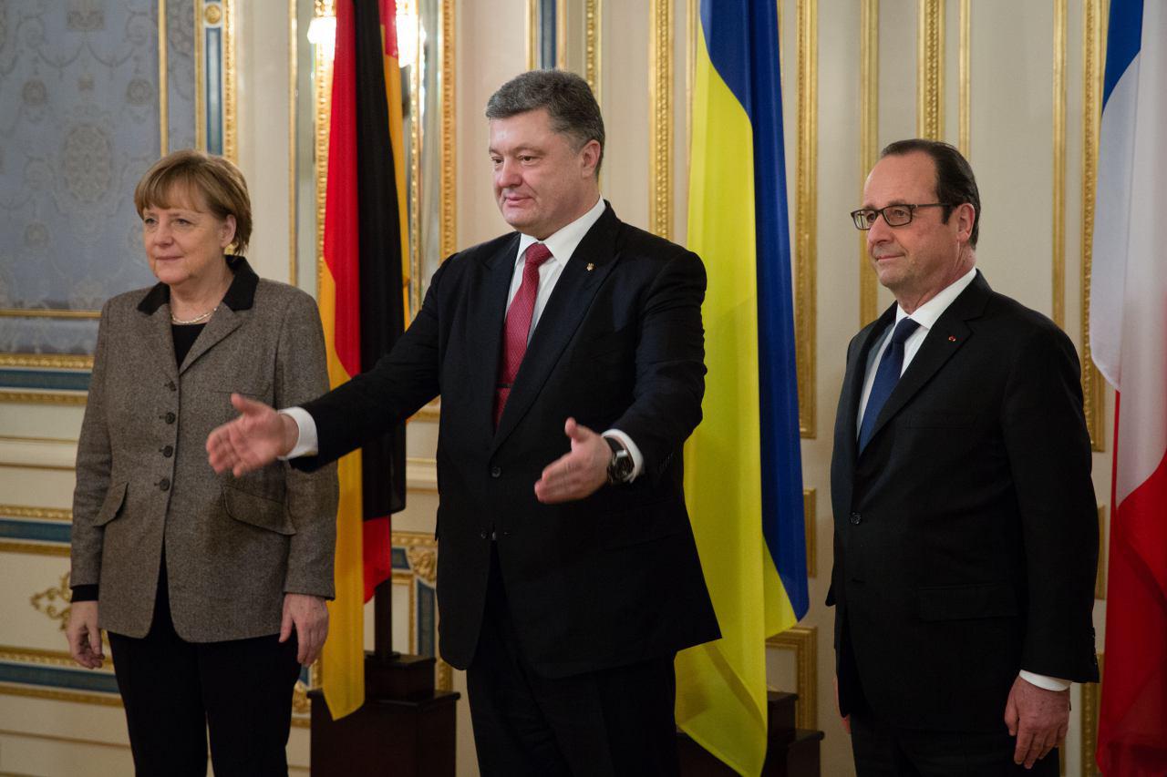 Какое решение приняли Олланд, Меркель и Порошенко