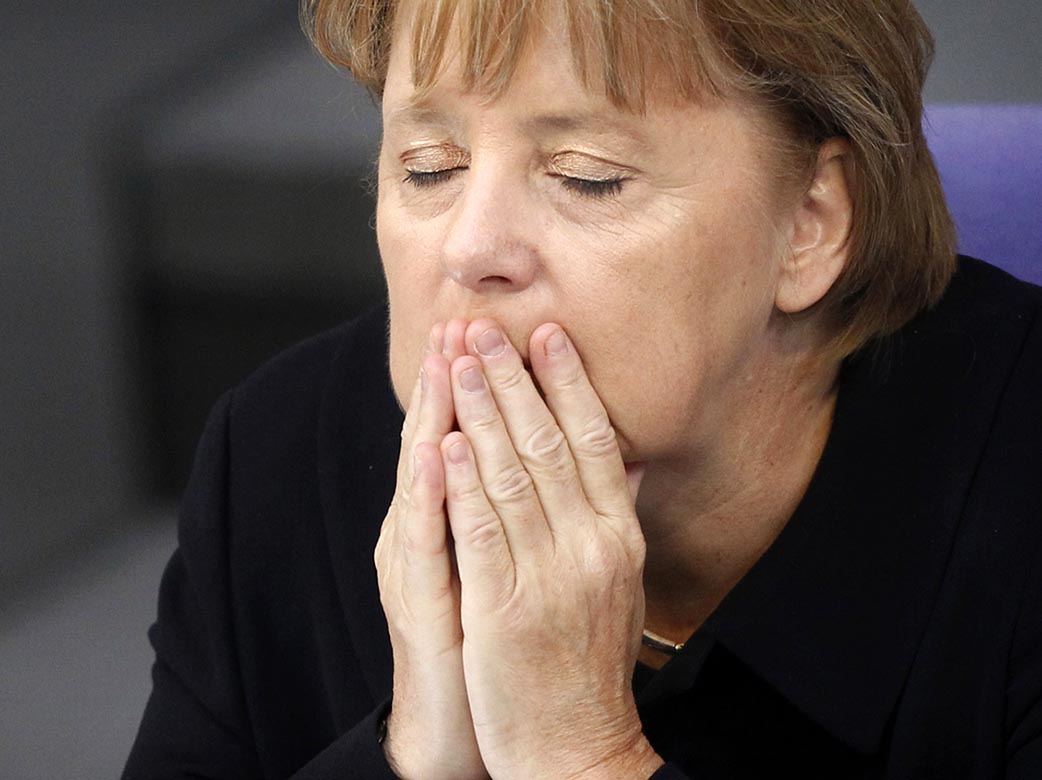 Меркель взывает США к международному сотрудничеству