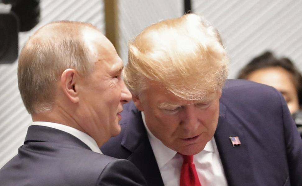 «Встреча на ногах» Путина и Трампа: язык тела сказал больше, чем слова «Встреча на ногах» Путина и Трампа: язык тела сказал больше, чем слова