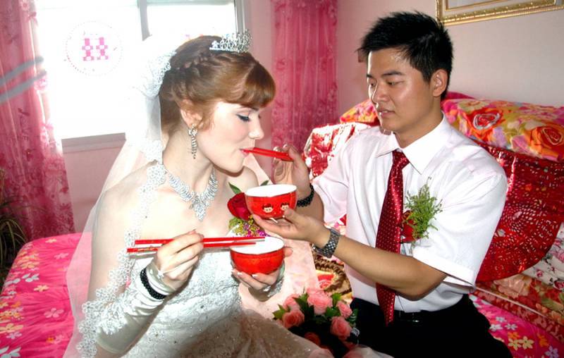 «Новое оружие» Поднебесной: русские девушки выходят замуж за китайцев