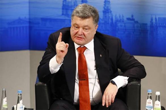 Порошенко превращает украинский народ в оскаленного хищника