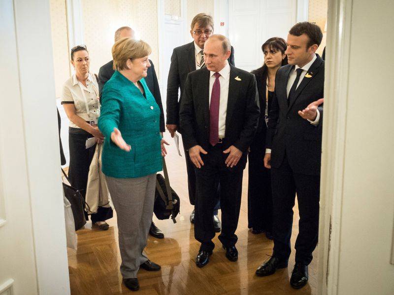 «Путин с отличными картами»: немецкие СМИ о встрече в Париже