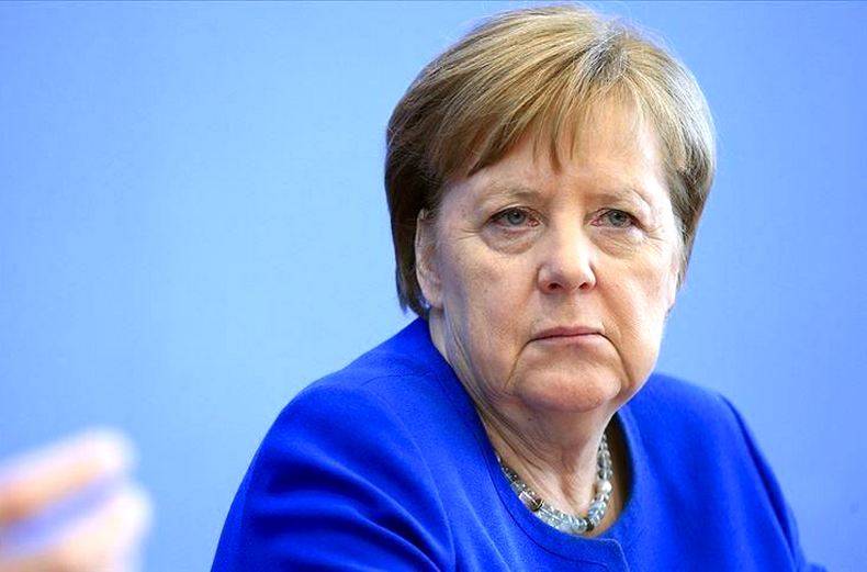 Меркель села на геополитический «шпагат»