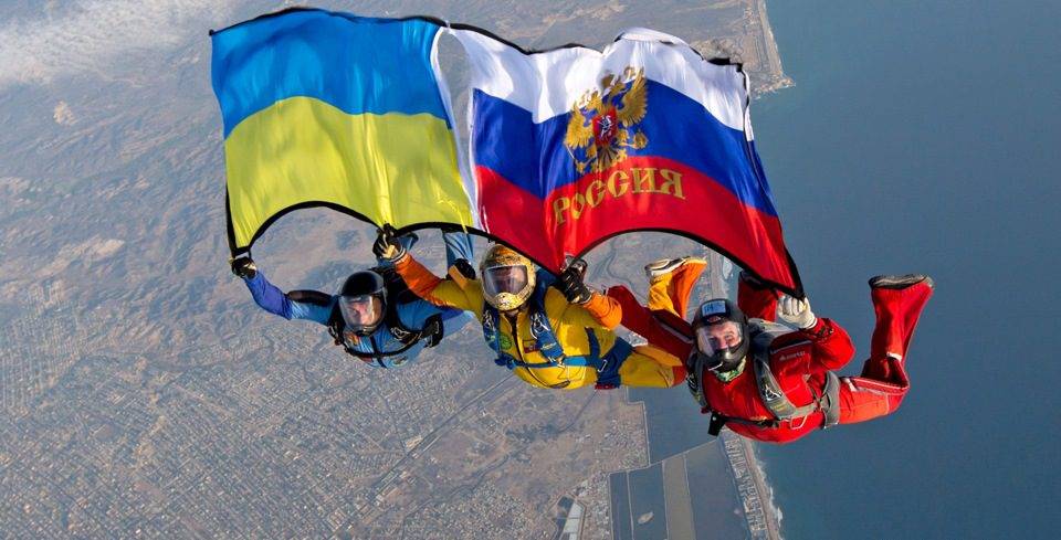 Украину и Россию хотят помирить под флагами, которые стали причиной ссоры